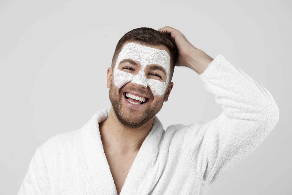 affluent-male-customer-with-white-beauty-mask